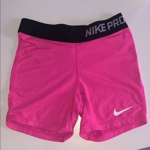 light pink youth nike pros